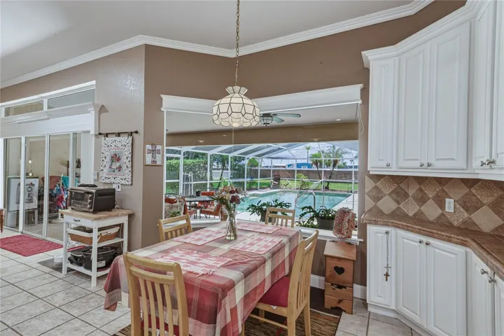 The view from the dinette makes checking out the pool and backyard easy.