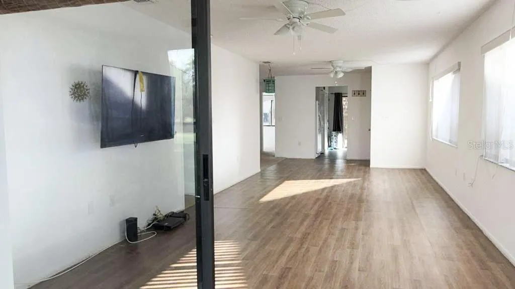 From back porch to living room dining room combo