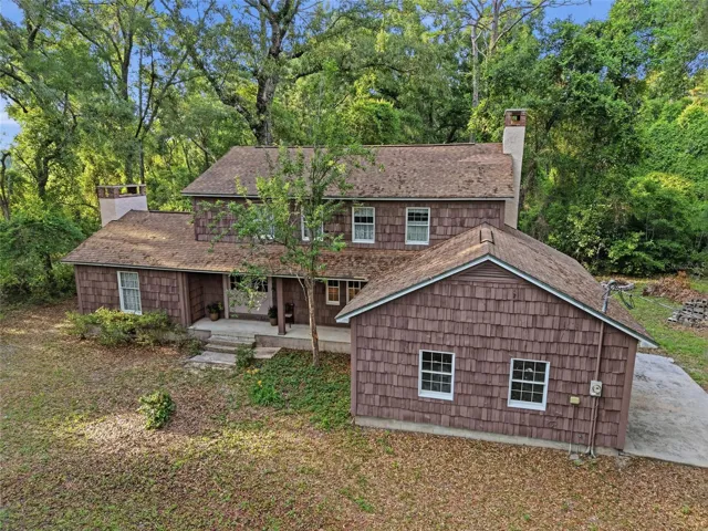 Fall in love with the warmth, craftsmanship, and unmistakable character of this one-of-a-kind owner-built estate nestled on 5 beautiful acres.