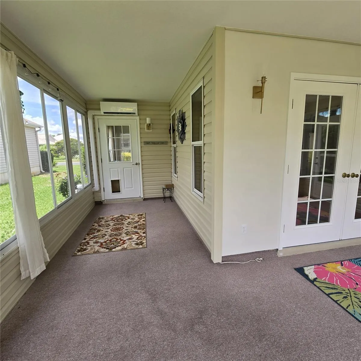 Enclosed Lanai View of Door to Breakfast/Kitchen Area