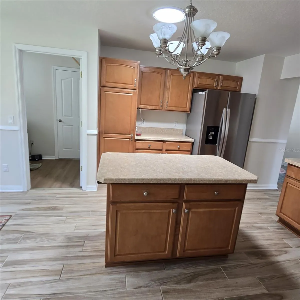Kitchen v/view to Laundry & Garage
