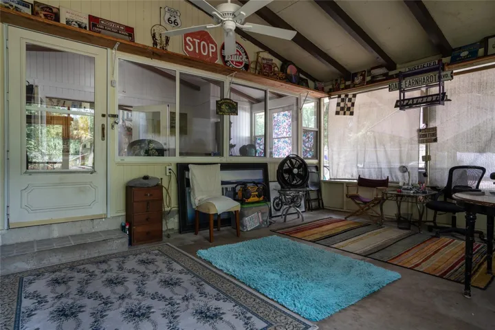 Covered, screened in family room