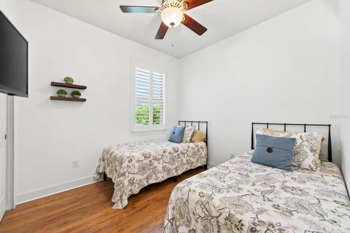 Two additional bedrooms and another full bath provide flexibility for guests, hobbies, or a home office. Bedroom 3