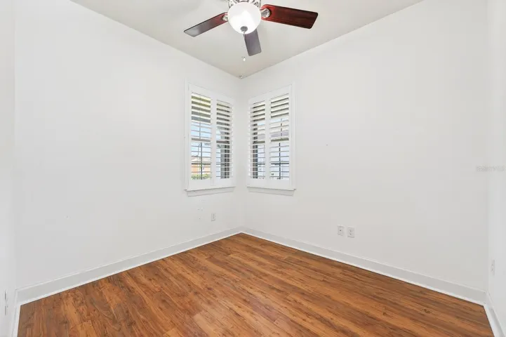 Two additional bedrooms and another full bath provide flexibility for guests, hobbies, or a home office. Bedroom 2
