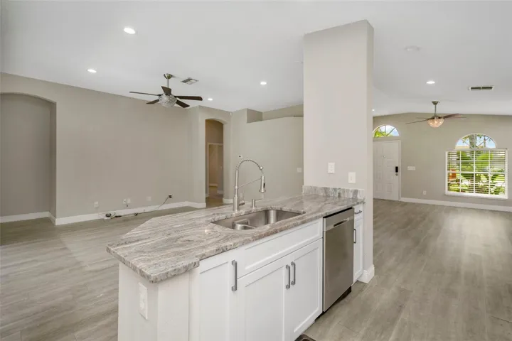 Kitchen, showing part of family room
