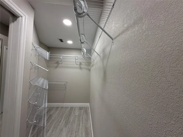 Expanded and Upgraded Walk-in Closet Primary Bedroom