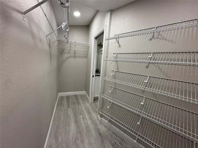 Expanded and Upgraded Walk-in Closet in Primary Bedroom