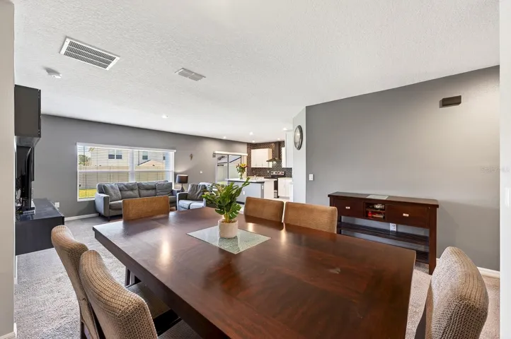 Step inside to discover a bright and inviting layout where the Living Room and Dining Room offer an OPEN, AIRY FEEL, creating the perfect space for entertaining or everyday living.