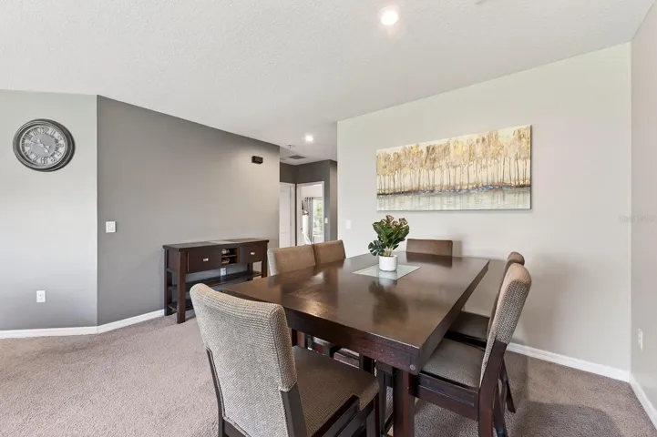 Step inside to discover a bright and inviting layout where the Living Room and Dining Room offer an OPEN, AIRY FEEL, creating the perfect space for entertaining or everyday living.
