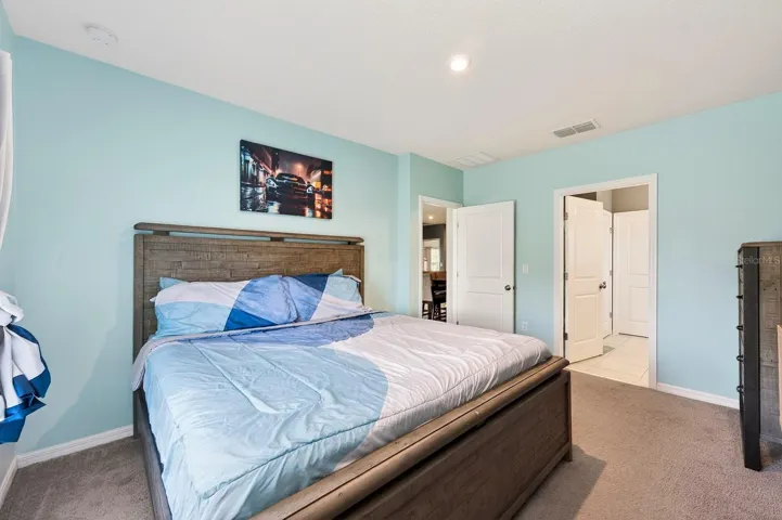 A desirable SPLIT-BEDROOM FLOOR PLAN provides added privacy, with the Primary Suite tucked away at one end of the home.