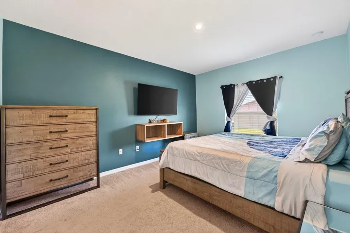 A desirable SPLIT-BEDROOM FLOOR PLAN provides added privacy, with the Primary Suite tucked away at one end of the home.
