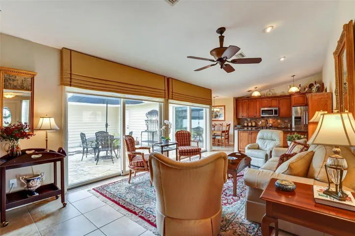Spacious family room with open kitchen access.