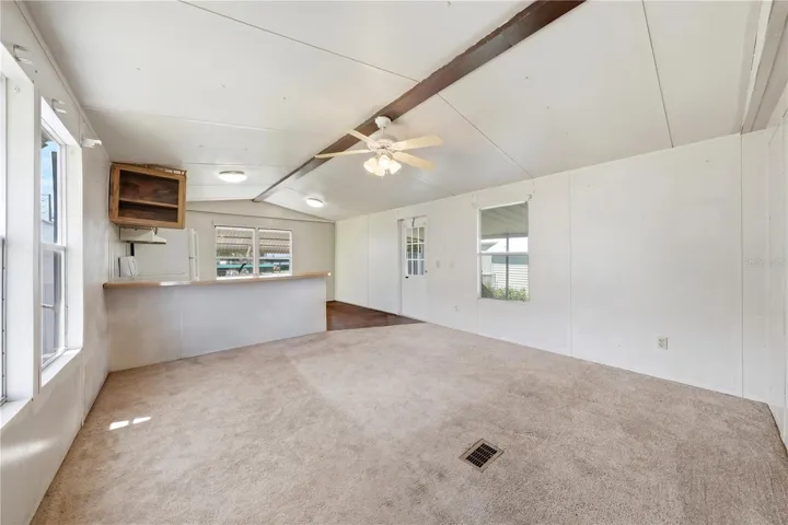 Living room with counter seating at Kitchen counter