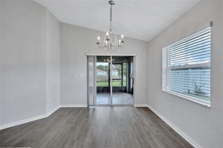 Dining Area that Leads out to the Covered & Screened-In Lanai