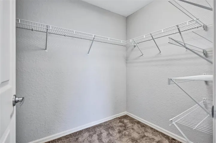 Primary Suite Walk-In Closet