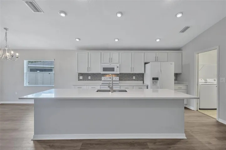 Featuring Gorgeous Quartz Countertops, Solid Wood Soft Close Cabinetry