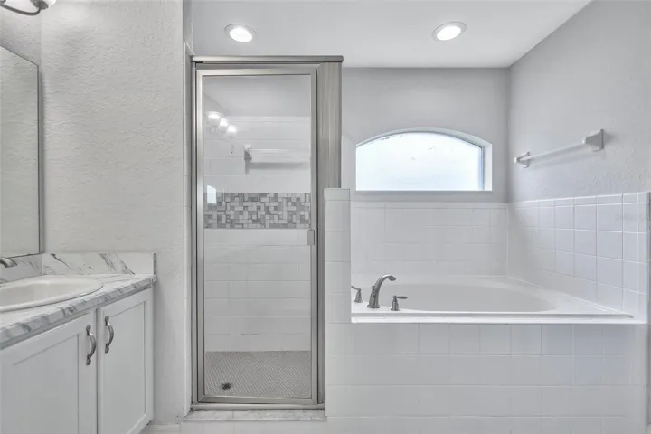 Primary Ensuite Featuring a Garden Tub & Walk-In Shower