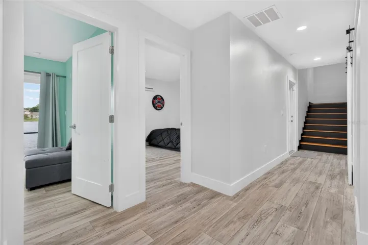 Back inside on the lower lakefront level, you'll find 3 bedrooms, plus 2 full bathrooms!