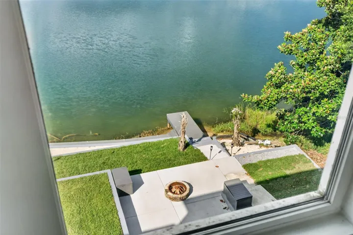 View from office of your fire pit and one of your docks.