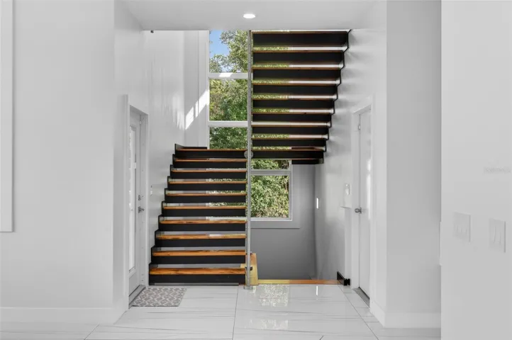 Heading upstairs on your custom wood staircase, you'll find your master suite, complete with office. All rooms overlook beautiful Lake Louise!