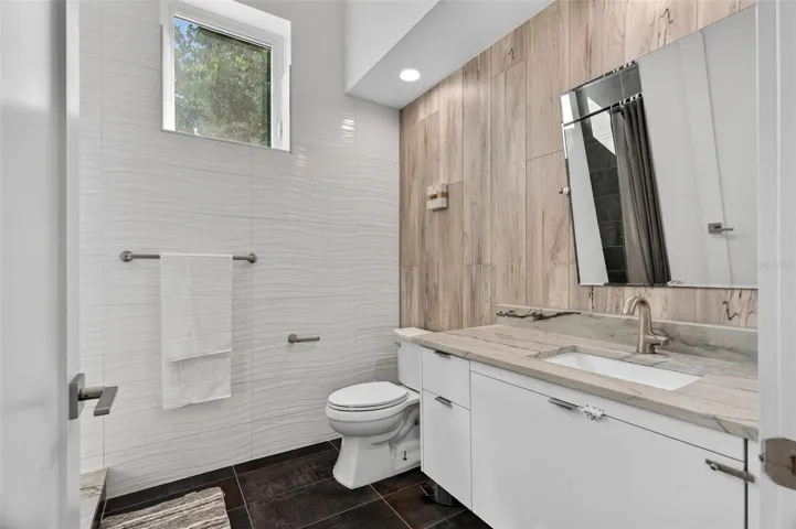 Modern full bath on main level.