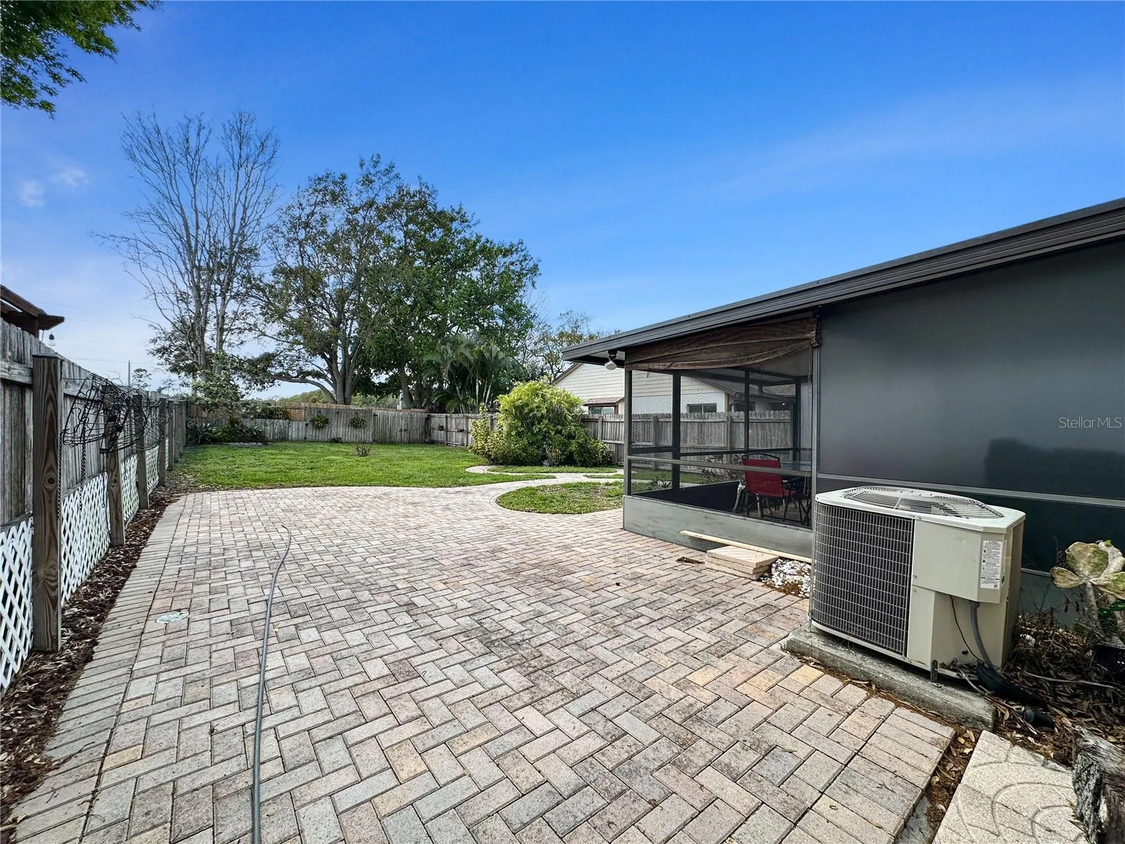 Paved area allows your full display of the oversized patio at your disposal.