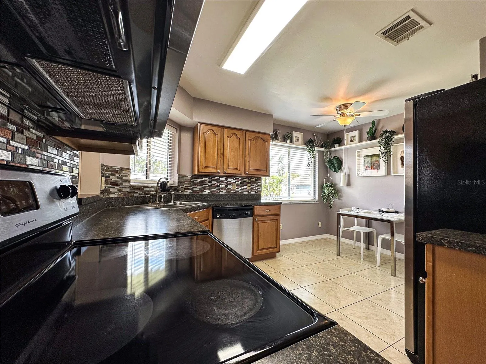 View with the Kitchen eat in space.