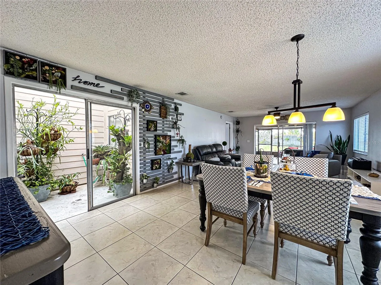 Another view of the Large Great Room up to the Sliding door that goes to the rear porch and then the rear patio.
