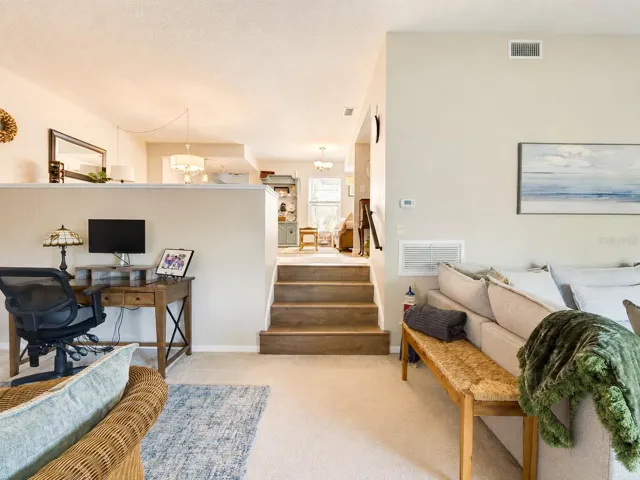 Living Room: Steps to the Dining &amp; Kitchen Areas