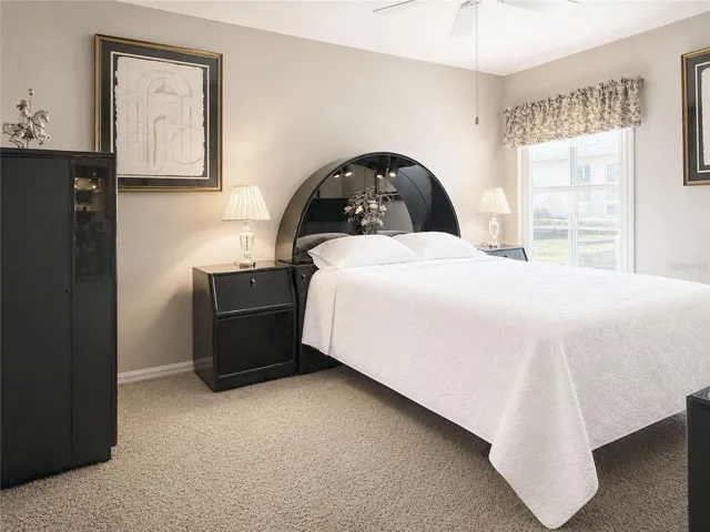 Primary bedroom with walk in closet and en-suite bathroom