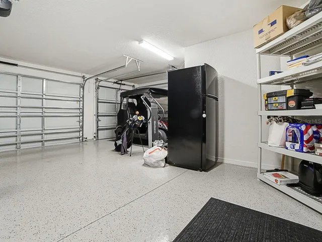 Immaculate garage with epoxy coated floors!