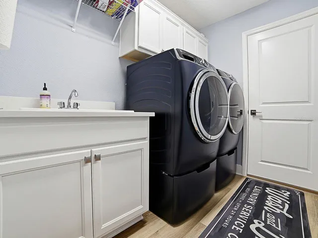 Convenient laundry room, new washer and dryer included!