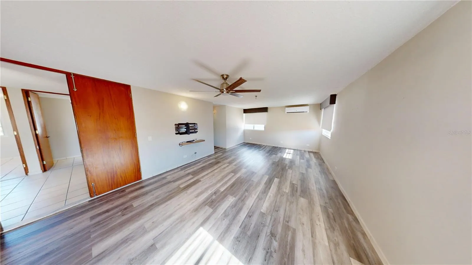 Spacious primary suite with double entrance doors