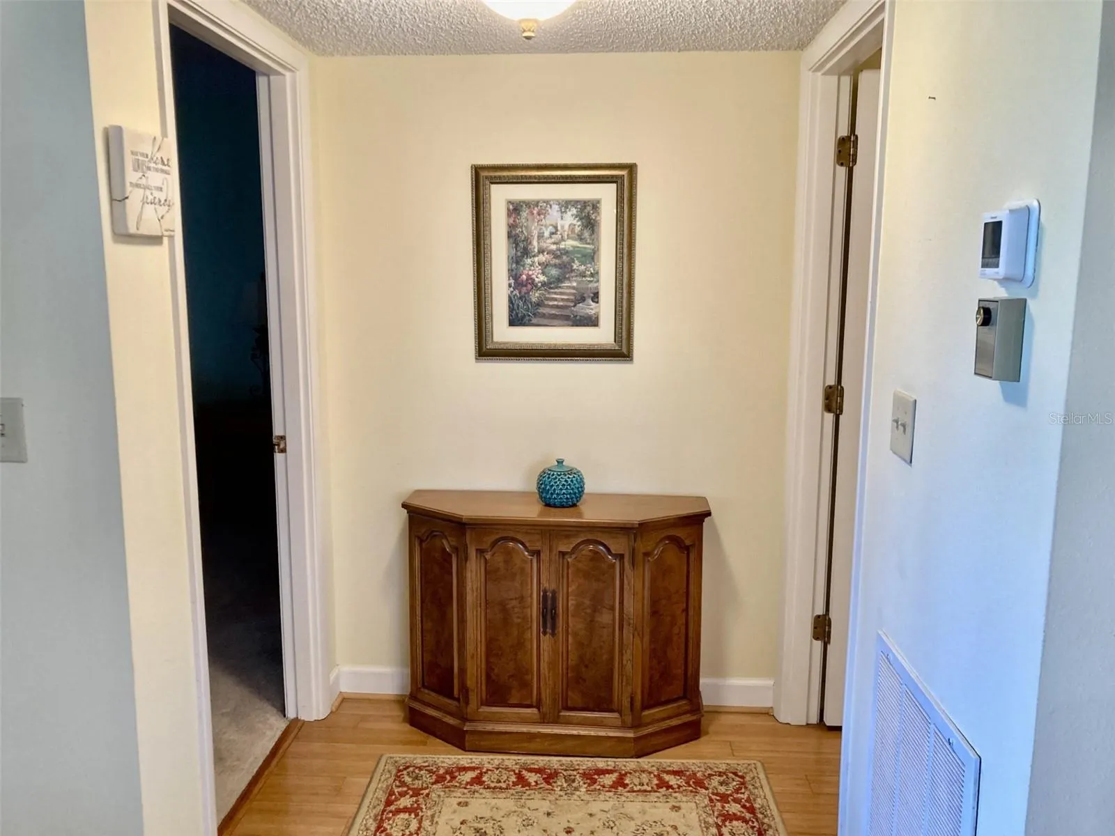Hall between bedrooms.