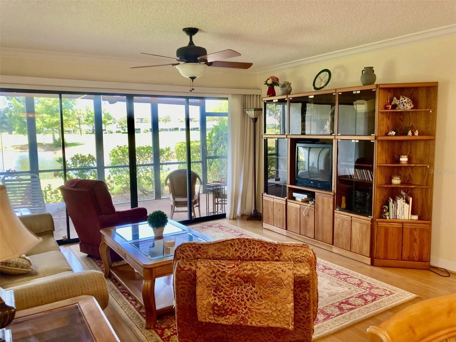 Living room with sliding glass doors to porch.