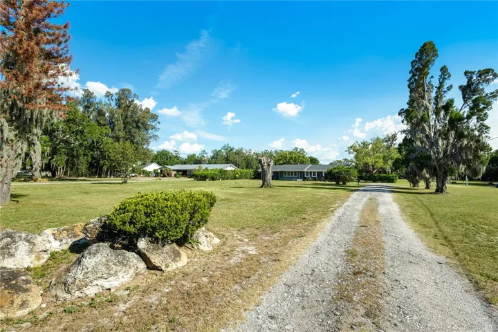 Long driveway, sitting back off the road.