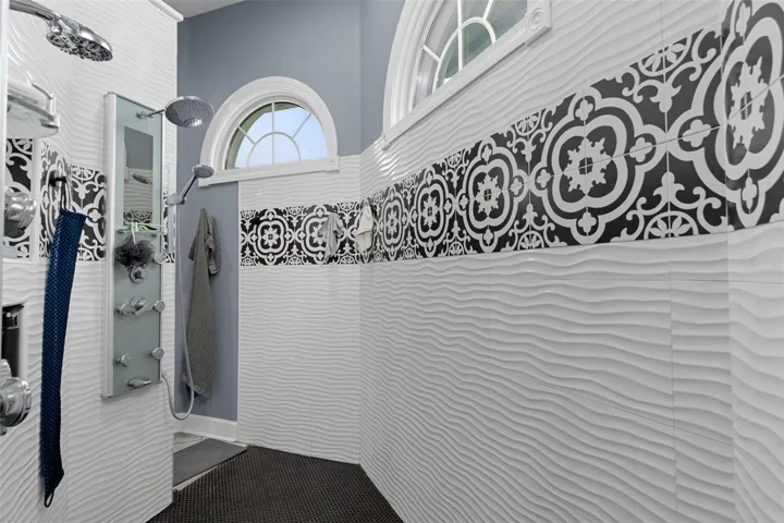 Walk through shower with double shower heads