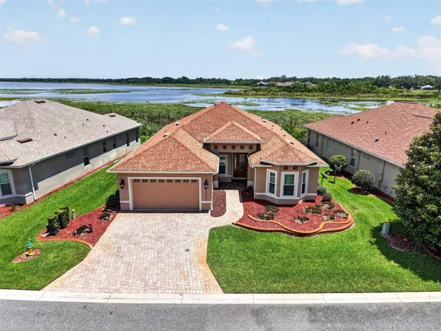 LOVELY "LAKESIDE" MODEL HOME WITH 3 BEDROOM, 2 BATH + DEN/OFFICE WITH SPECTACULAR VIEW OF LAKE MIONA LOCATED IN THE GATED COMMUNITY OF LAKESIDE LANDINGS!