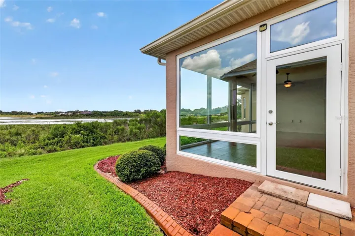 SIDE YARD SHOWING BACKYARD AND VIEW.