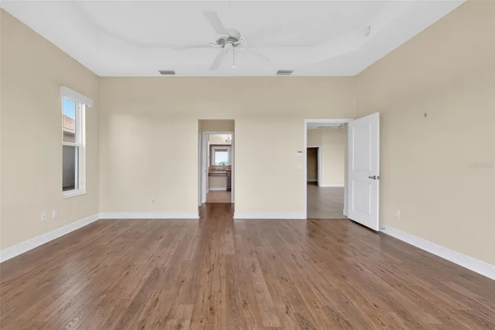 ENTRANCE TO THE 2 WALK-IN CLOSETS AND THE EN-SUITE BATH.