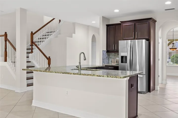 Stunning Staircase Open to Great Room