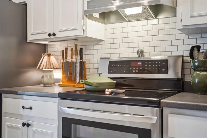 Kitchen - newer range and newer backsplash