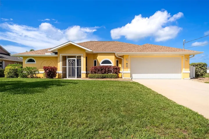 Florida style home, beautifully maintained yard and landscaping. Updated Irrigation system.