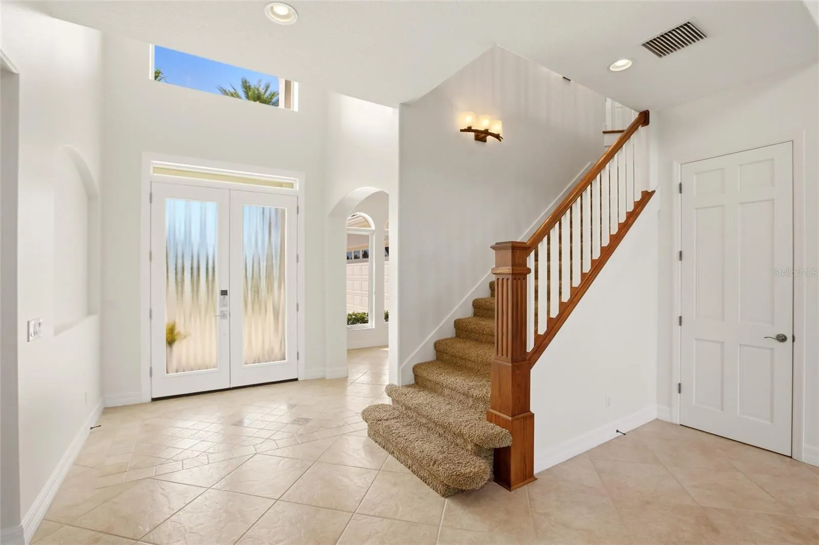 A dramatic two-story foyer welcomes you into the home.