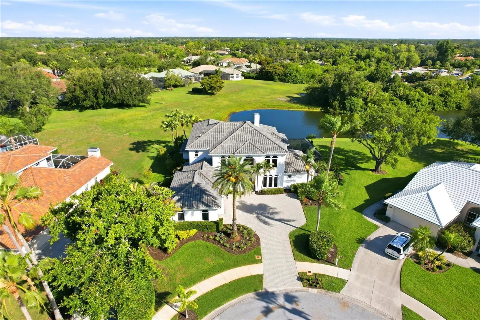 Located in a quiet culdesac with serene views of the lake and 18th Hole.