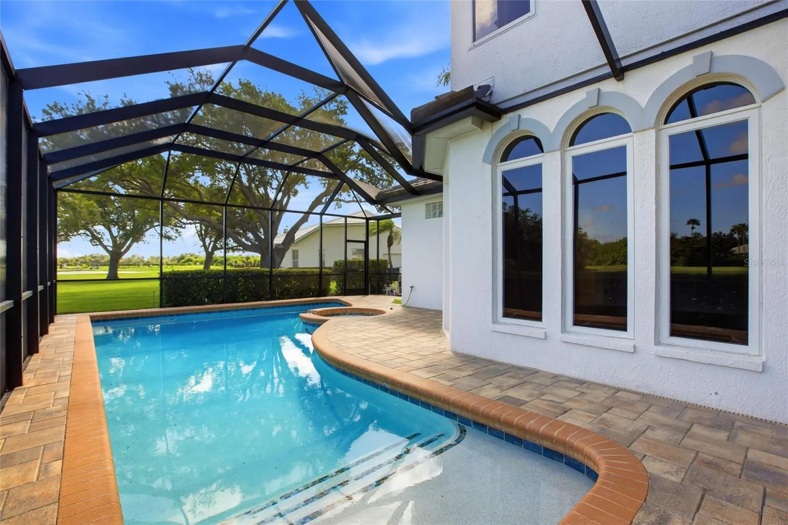 Enjoy resort-style living with a heated pool and spa overlooking the 18th hole, tranquil lake views, and the natural beauty of Misty Creek, where deer are often seen roaming the landscape.
