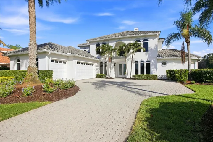 An extensive paver driveway off of the culdesac invites you to 8417 Lone Eagle Way.