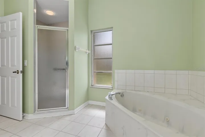 Step-in stall shower