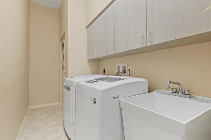 Laundry room with utility sink