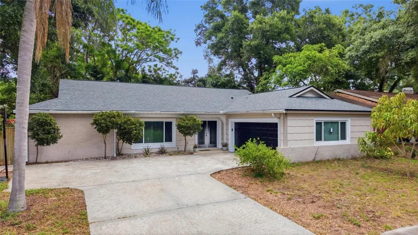 FRONT of HOME with NEW ROOF with Garage